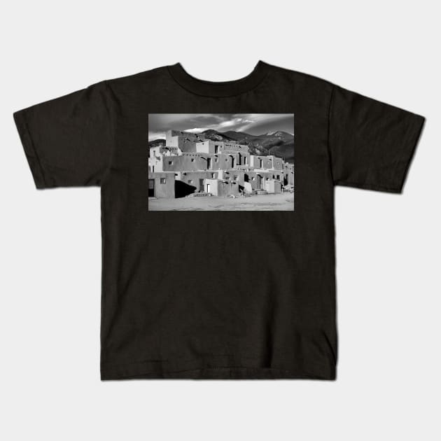 Taos Pueblo North Kids T-Shirt by bobmeyers